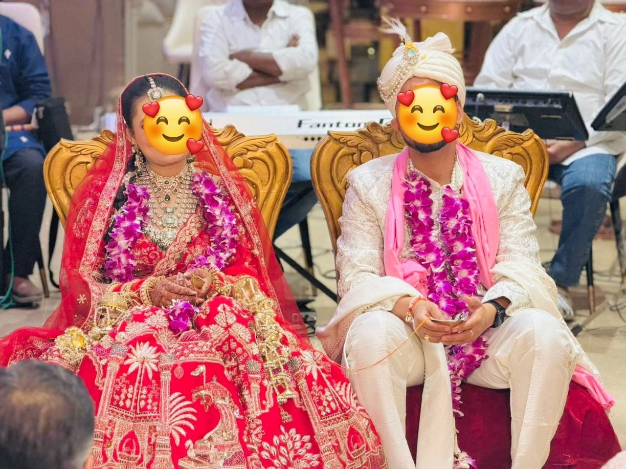 Real Arya Samaj Marriage couple at Arya Samaj Mandir Delhi — bride in red lehenga, groom in cream sherwani with jaimala